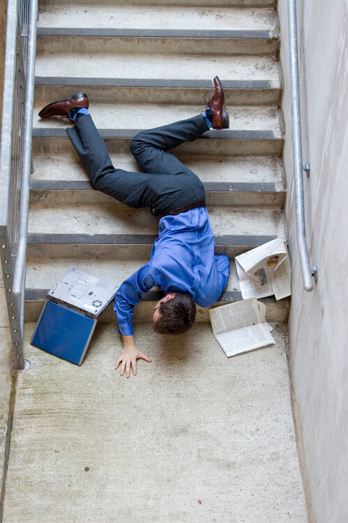 iStock_2245633_work-injury-fall-on-stairs.jpg